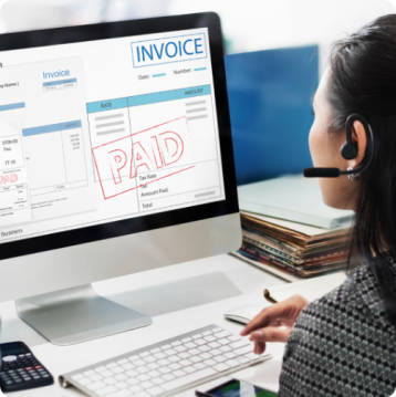Highlight_Feature_FFPS1 Young woman looking at a desktop screen that has photos of an invoice on it