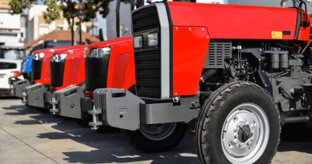 image-of-dealership(1) a fleet of red agricultural heavy equipment