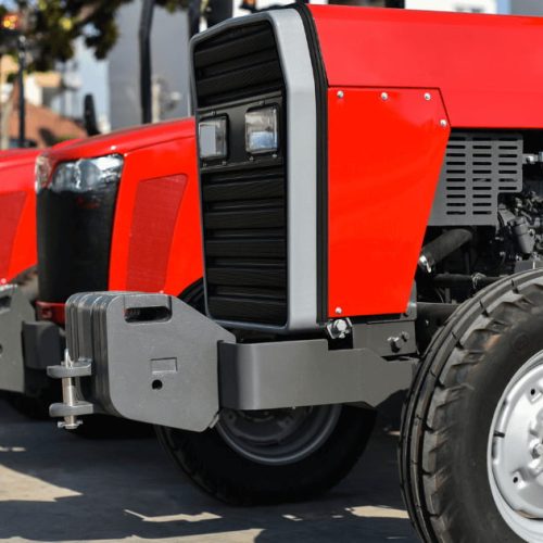 image-of-dealership(1) a fleet of red agricultural heavy equipment