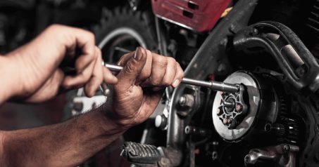 image-of-a-service-technician(1) image of a service technician fixing a wheel