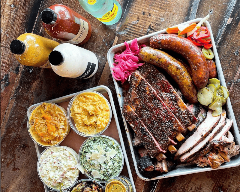 truth-bbq-restaurants in houston-1 A spread for bbq meals like ribs, sausage and sides dishes from Truth BBQ in Houston