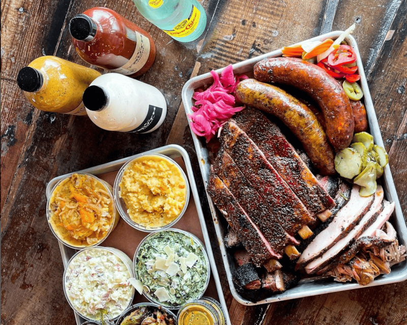 truth-bbq-restaurants in houston-1 A spread for bbq meals like ribs, sausage and sides dishes from Truth BBQ in Houston