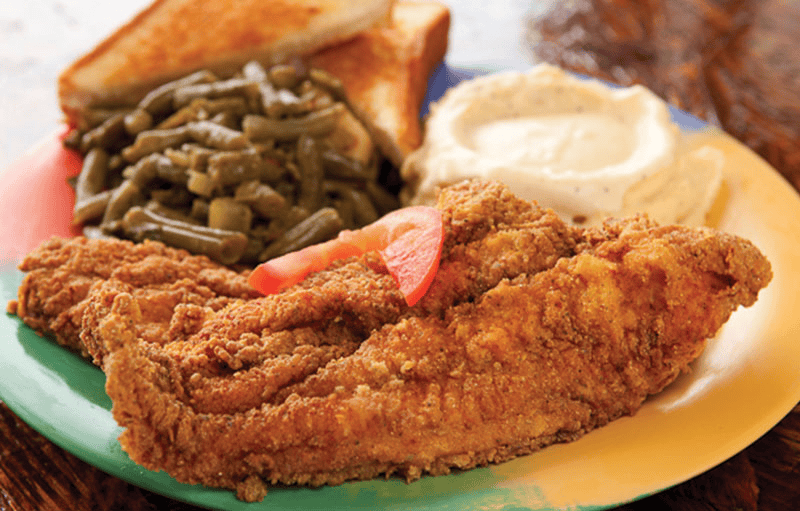 The-Breakfast-Klub- restaurants in houston-4 A plate of catfish and grits from The Breakfast Klub