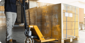 worker-courier-unloading-package-boxes-warehouse-shipent-boxes-supply-chain-shipping Warehouse pallet